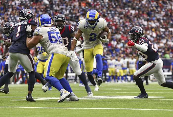 Oct 31, 2021; Houston, Texas, USA; Los Angeles Rams wide receiver Robert Woods (2) runs with the ball for a touchdown during the third quarter against the Houston Texans at NRG Stadium